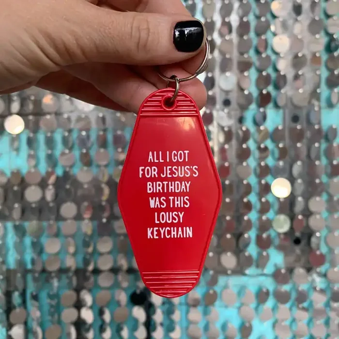 All I Got For Jesus‘s Birthday Christmas Motel Style Keychain in Red
